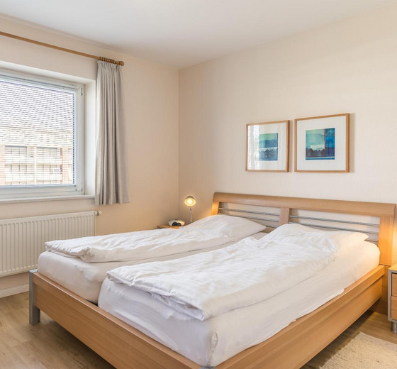 Schlafzimmer mit Bett-Seewärts Wohnen, Whg. 2.5 - Ferienhaus / Ferienwohnung Büsum -  9