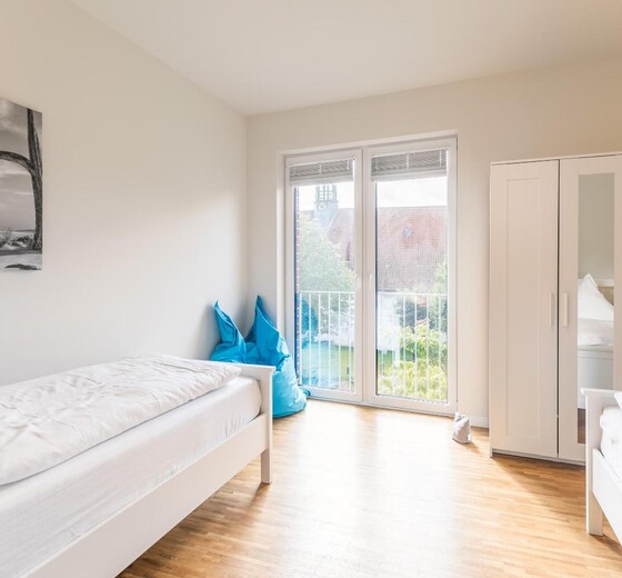Schlafzimmer 2 mit Einzelbetten-Bi de Kark - Ferienhaus / Ferienwohnung Büsum -  16
