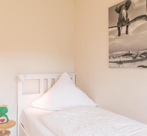Schlafzimmer mit Einzelbett-Bi de Kark - Ferienhaus / Ferienwohnung Büsum -  18