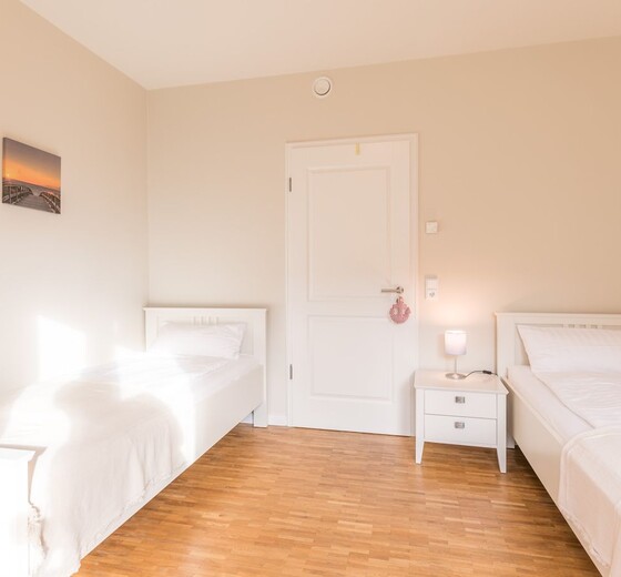 Schlafzimmer 2 mit Einzelbetten-Nordlichter - Ferienhaus / Ferienwohnung Büsum -  21