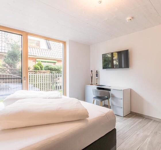Blick ins zweite Schlafzimmer-Antons Strandnest - Ferienhaus / Ferienwohnung Büsum -  12