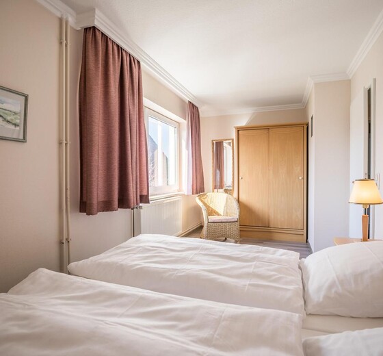 Schlafzimmer mit Bett-Appartementhaus Meeresbucht Whg. 8 - Ferienhaus / Ferienwohnung Büsum -  10
