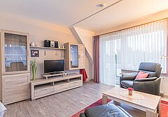Wohnzimmer mit TV-Am Altenhof Whg. 6 - Ferienhaus / Ferienwohnung Büsum - 5
