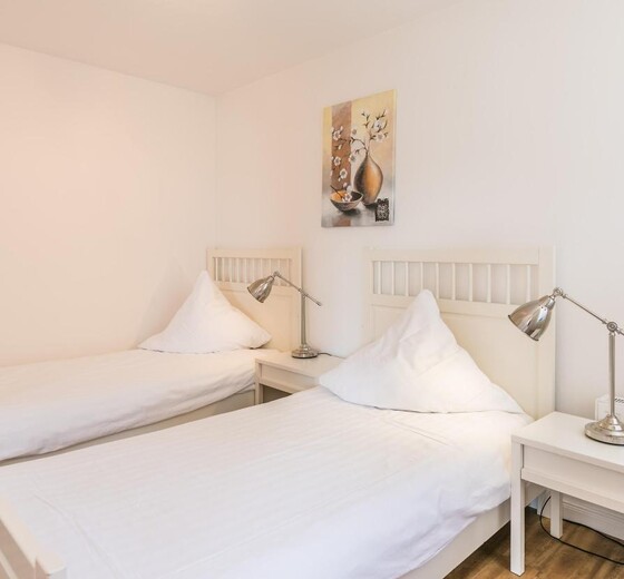 Schlafzimmer 3 / Einzelbetten-Holstenterrasse - Ferienhaus / Ferienwohnung Büsum -  26