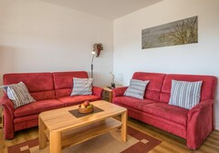 Wohnzimmer mit Sofa-Appartement im Hochhaus - Ferienhaus / Ferienwohnung Büsum - 3