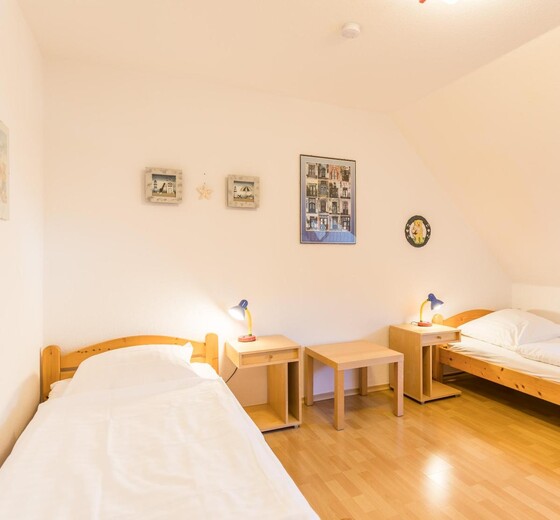 Blick in Schlafzimmer 2-Ferienhaus Jaedicke - Ferienhaus / Ferienwohnung Büsum -  20