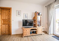 Wohnzimmer mit TV-Ferienwohnung Nautik - Ferienhaus / Ferienwohnung Büsum - 5