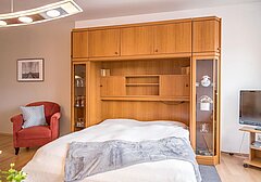 Wohnzimmer mit Schrankbett-Haus Kattegat, Whg. 4 - Ferienhaus / Ferienwohnung Büsum - 5