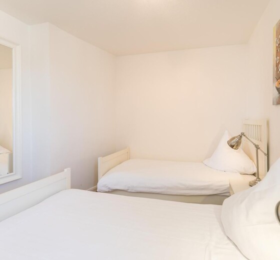Blick in Schlafzimmer3-Holstenterrasse - Ferienhaus / Ferienwohnung Büsum -  28