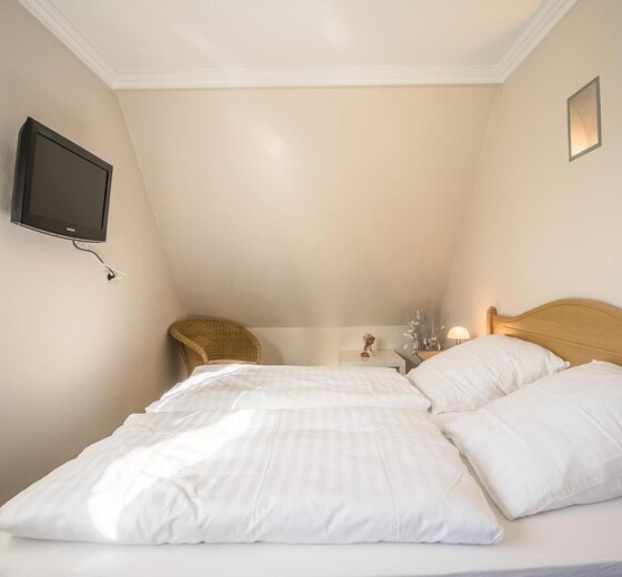 Schlafzimmer mit Bett-Appartementhaus Meeresbucht Whg. 7 - Ferienhaus / Ferienwohnung Büsum -  7