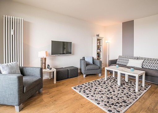 Wohnzimmer mit Sofa-Haus Rainer, Whg. 44 - Ferienhaus / Ferienwohnung Büsum - 1