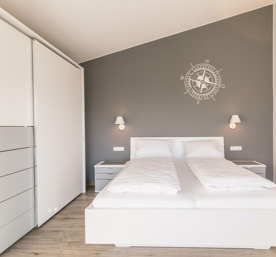 Schlafzimmer mit Kleiderschrank-Wohnung Admiral, Penthouse-Wohnung - Ferienhaus / Ferienwohnung Büsum -  22