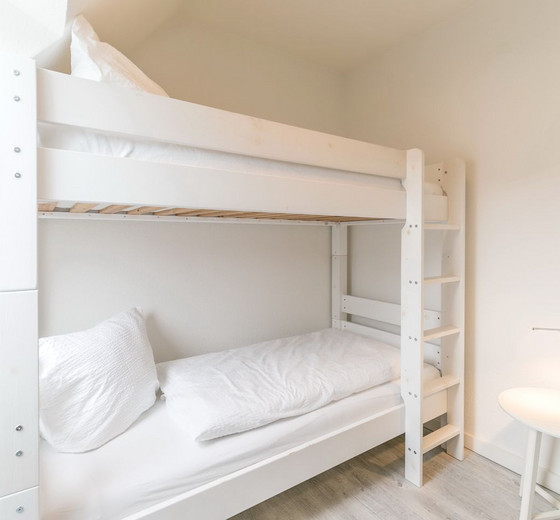Schlafzimmer mit Etagenbetten-deichlodge, lodge.drei - Ferienhaus / Ferienwohnung Büsum -  15