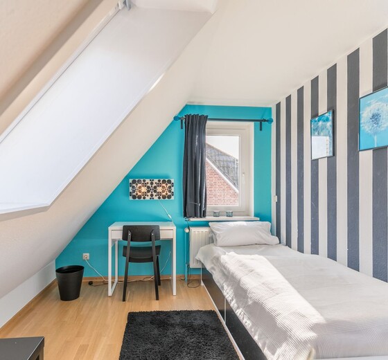 Schlafzimmer mit Einzelbetten-Haus Wassermann 21a - Ferienhaus / Ferienwohnung Büsum -  27