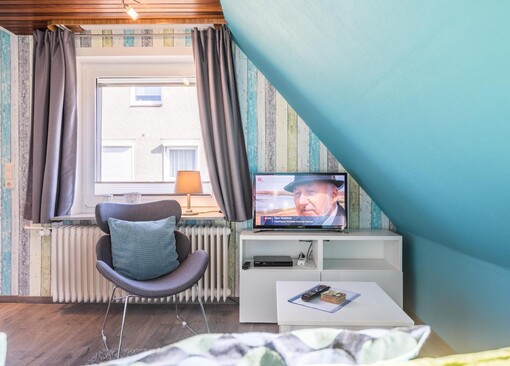 Wohnzimmer mit TV-Haus Strandbrise, Whg. 4 - Ferienhaus / Ferienwohnung Büsum - 1