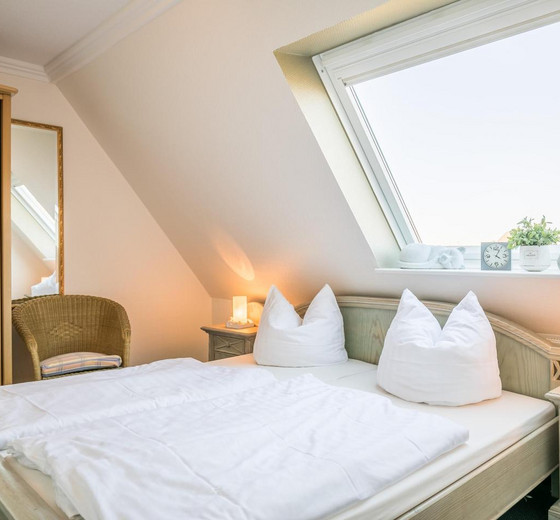 Schlafzimmer mit Bett-Appartementhaus Meeresbucht Whg. 11 - Ferienhaus / Ferienwohnung Büsum -  15