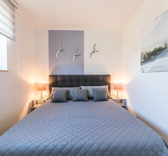 Doppelbett im Schlafzimmer-Stille Bucht, Whg. 2 - Ferienhaus / Ferienwohnung Büsum -  10
