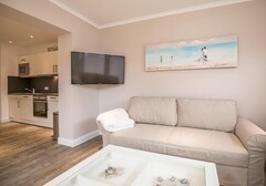 Wohnzimmer Sofa mit Schlaffunktion-Strandpirat 2, Whg. Dünensand - Ferienhaus / Ferienwohnung Büsum - 3
