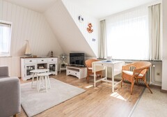 Wohnzimmer mit Tisch-Annabelle Whg. 1 - Ferienhaus / Ferienwohnung Büsum - 3