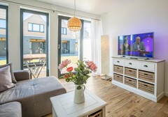 Wohnzimmer mit TV-"Beach House 4, Strandkoje 4.3" - Ferienhaus / Ferienwohnung Büsum - 3