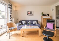 Wohnzimmer mit Sofa-Moiken - Ferienhaus / Ferienwohnung Büsum - 5