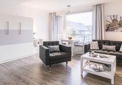 Wohnzimmer mit Schrankbett-Nordseekante, Whg. 365 - Ferienhaus / Ferienwohnung Büsum - 3