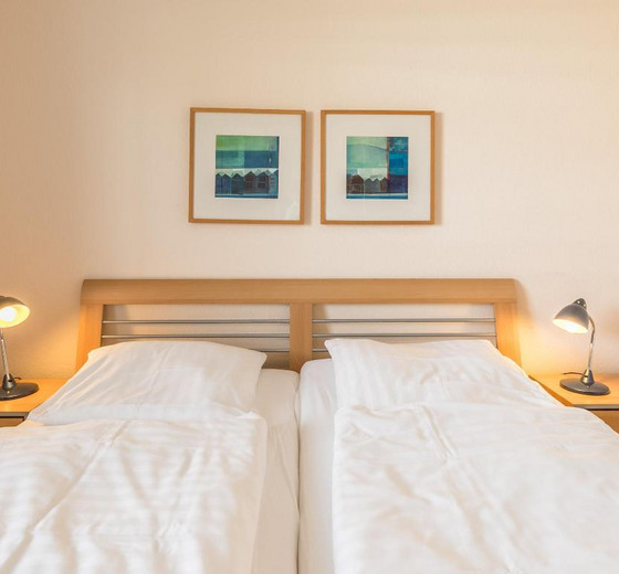 Doppelbett im Schlafzimmer-Seewärts Wohnen, Whg. 2.5 - Ferienhaus / Ferienwohnung Büsum -  10