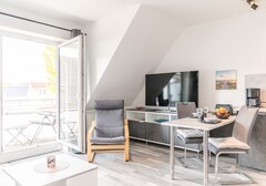Wohnzimmer mit TV-Strandglück - Ferienhaus / Ferienwohnung Büsum - 3