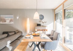 Wohnzimmer mit Esstisch-Antons Strandnest- Ferienhaus / Ferienwohnung Büsum - 4