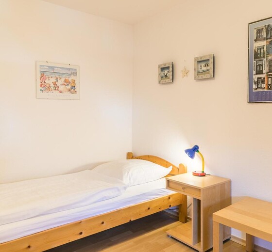 Schlafzimmer 2 Bett an der Wand-Ferienhaus Jaedicke - Ferienhaus / Ferienwohnung Büsum -  22