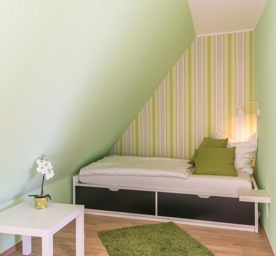 Schlafzimmer 4 mit Einzelbett-Haus Wassermann 21b - Ferienhaus / Ferienwohnung Büsum -  28