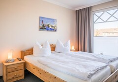 Schlafzimmer mit Bett-Appartementhaus Meeresbucht Whg. 6 - Ferienhaus / Ferienwohnung Büsum - 5