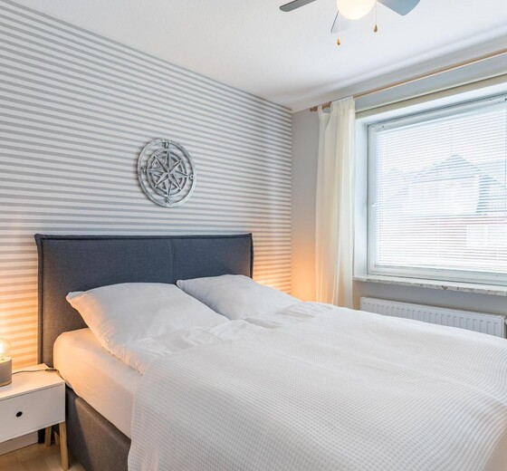 Schlafzimmer 1 mit Doppelbett-Theodor-Storm-Haus, Whg. 10 - Ferienhaus / Ferienwohnung Büsum -  10