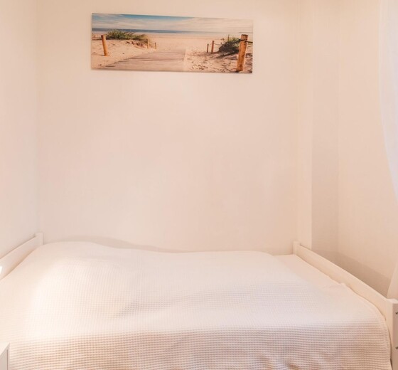 Schlafzimmer 2 mit Einzelbett-Ferienwohnung Schöne Aussicht - Ferienhaus / Ferienwohnung Westerdeichstrich -  16
