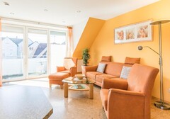 Wohnzimmer mit Sofa-Theodor-Storm-Haus, Whg. 13- Ferienhaus / Ferienwohnung Büsum - 4