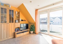 Wohnzimmer mit TV-Theodor-Storm-Haus, Whg. 13 - Ferienhaus / Ferienwohnung Büsum - 5