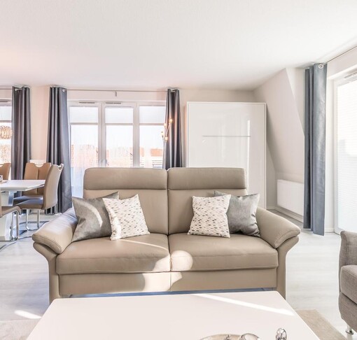 Wohnzimmer mit Sofa-"MeerGenuss", Penthouse-WHG - Ferienhaus / Ferienwohnung Büsum - 2