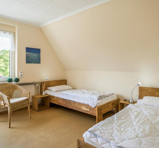 Schlafzimmer mit Einzelbetten-Appartement Svea - Ferienhaus / Ferienwohnung Büsum -  11